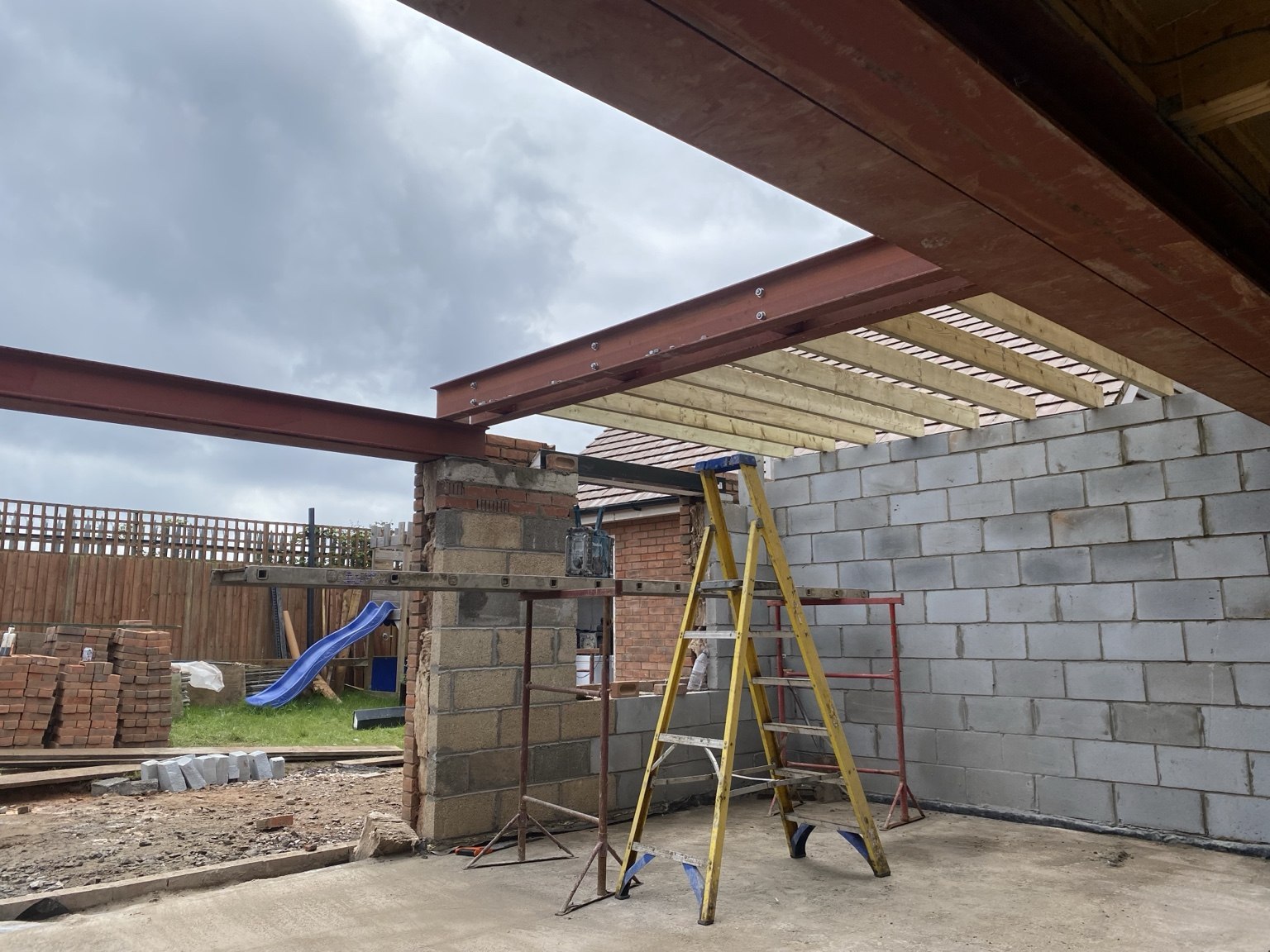 Steel framing and blockwork during an extension build